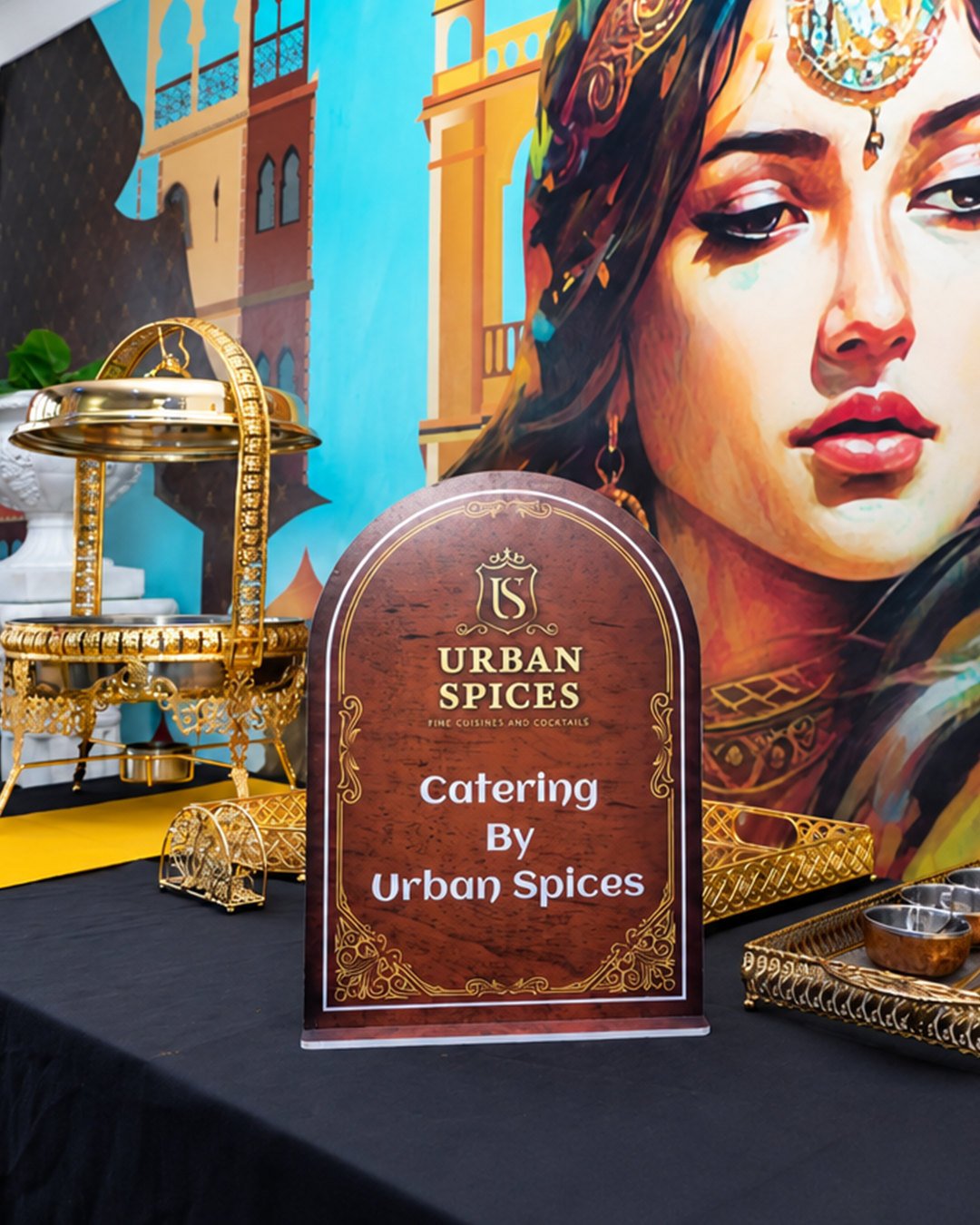 Catering by Urban Spices buffet set up with gold chafing dishes