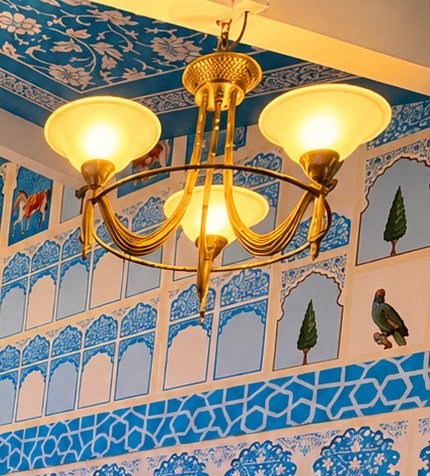 Brass chandeliers at Urban Spices Balmain